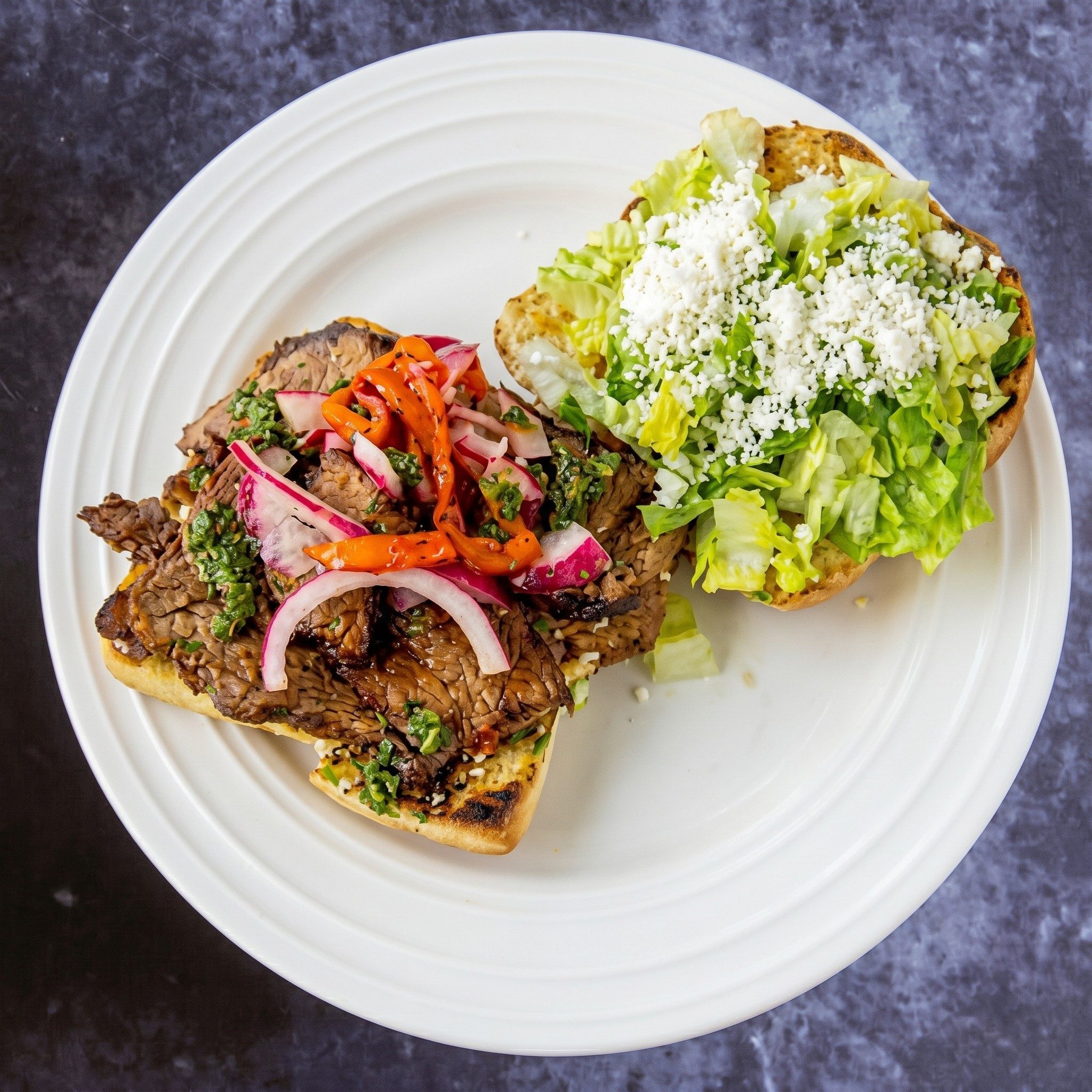 Thinly Sliced Grilled Tri-Tip Steak Sandwich.